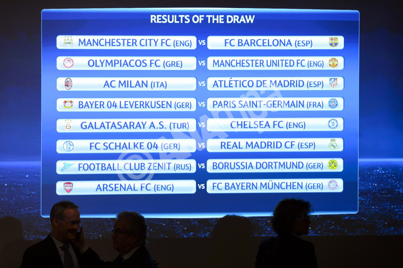 epa03993082 The match fixtures are shown on an electronic panel following the draw of the round of 16 games of UEFA Champions League 2013/14 at the UEFA Headquarters in Nyon, Switzerland, 16 December 2013.  EPA/LAURENT GILLIERON
