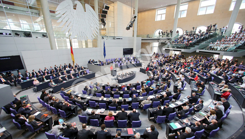 epa04850233 German Chancellor Angela Merkel (back C) delivers a speech during a special session of the German Bundestag over the proposed bailout package for Greece, in Berlin, Germany, 17 July 2015. The third Greece bailout agreement that was agreed on by the Eurozone leaders on 13 July morning after 17 hours of negotiations has to be approved by several national parliaments. The Bundestag vote comes just two days after Greek Prime Minister Tsipras rammed a tough set of tax-and-pension reforms through the legislature in Athens aimed at securing the new bailout.  EPA/WOLFGANG KUMM