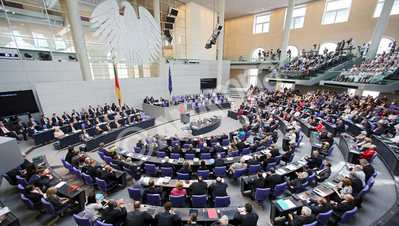 epa04850233 German Chancellor Angela Merkel (back C) delivers a speech during a special session of the German Bundestag over the proposed bailout package for Greece, in Berlin, Germany, 17 July 2015. The third Greece bailout agreement that was agreed on by the Eurozone leaders on 13 July morning after 17 hours of negotiations has to be approved by several national parliaments. The Bundestag vote comes just two days after Greek Prime Minister Tsipras rammed a tough set of tax-and-pension reforms through the legislature in Athens aimed at securing the new bailout.  EPA/WOLFGANG KUMM